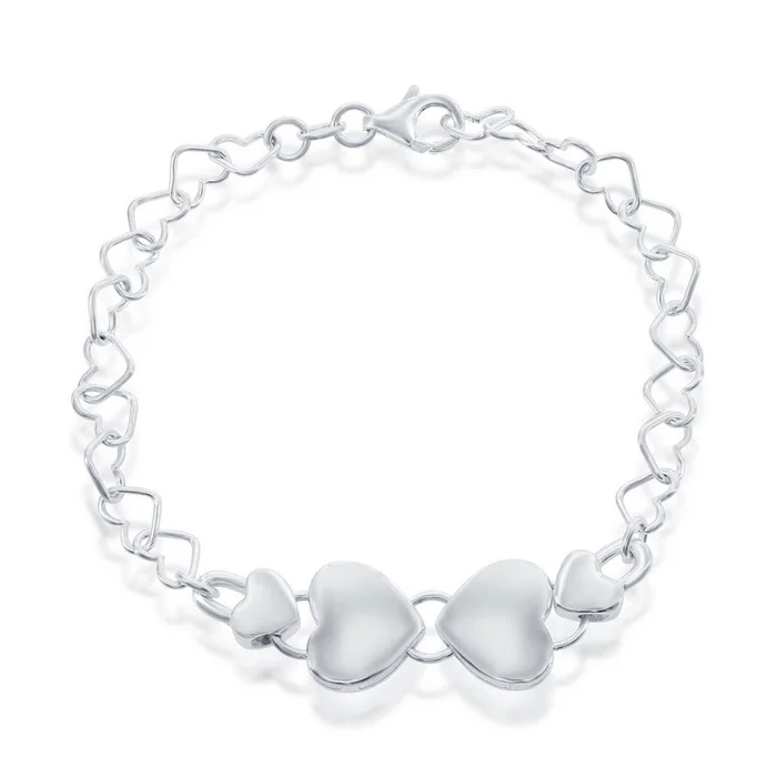 Classic Women’s Bracelet – Sterling Silver Link with 4 Center Hearts | S-4587