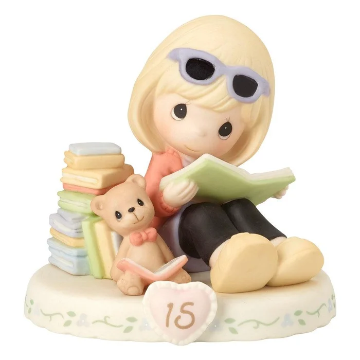 Precious Moments Growing in Grace Age Fifteen Porcelain Figurine
